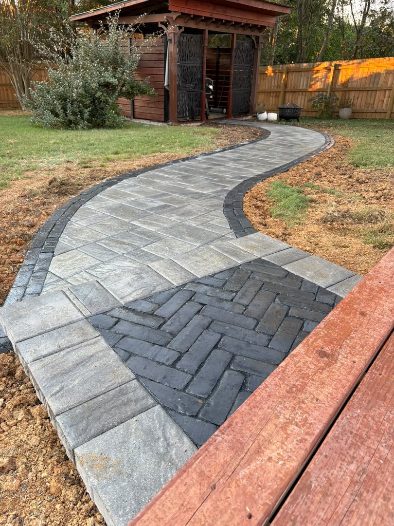 Curved paver walkway with herringbone inlay